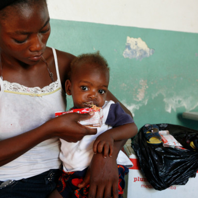 Mother and Child with MFK's Therapeutic Food